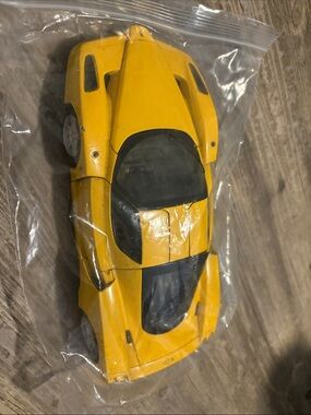 Yellow vintage Ferrari car toy